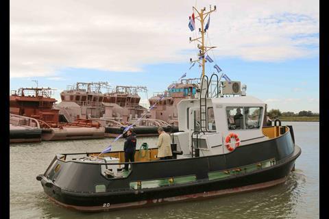 A Stan Tug 1205 sets out for a demo run passing part completed Sholbusters and Multi Cats